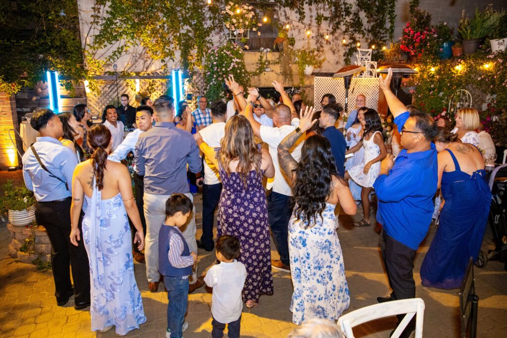 Guests of all ages on the dance floor at an Arnoldi's Cafe wedding in Santa Barbara