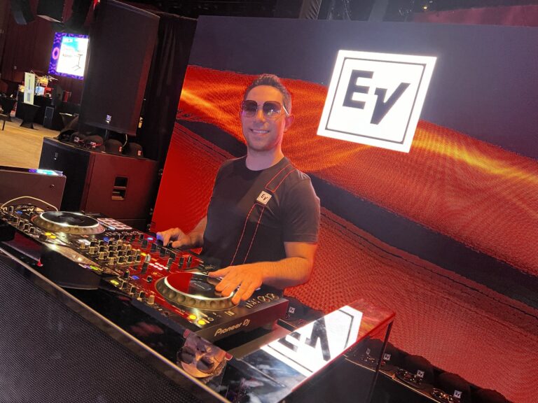 DJ JAS at the Electro-Voice booth at DJX 2024