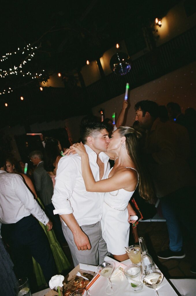Newlyweds kissing on the dance floor at El Paseo