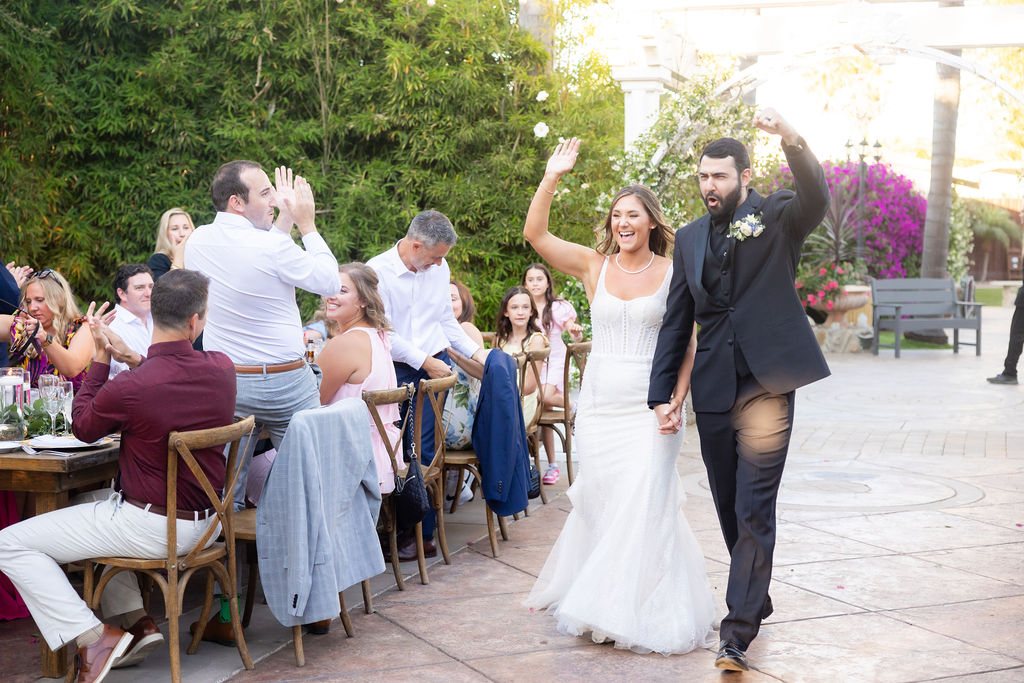Grand entrance into the reception at Rancho de las Palmas